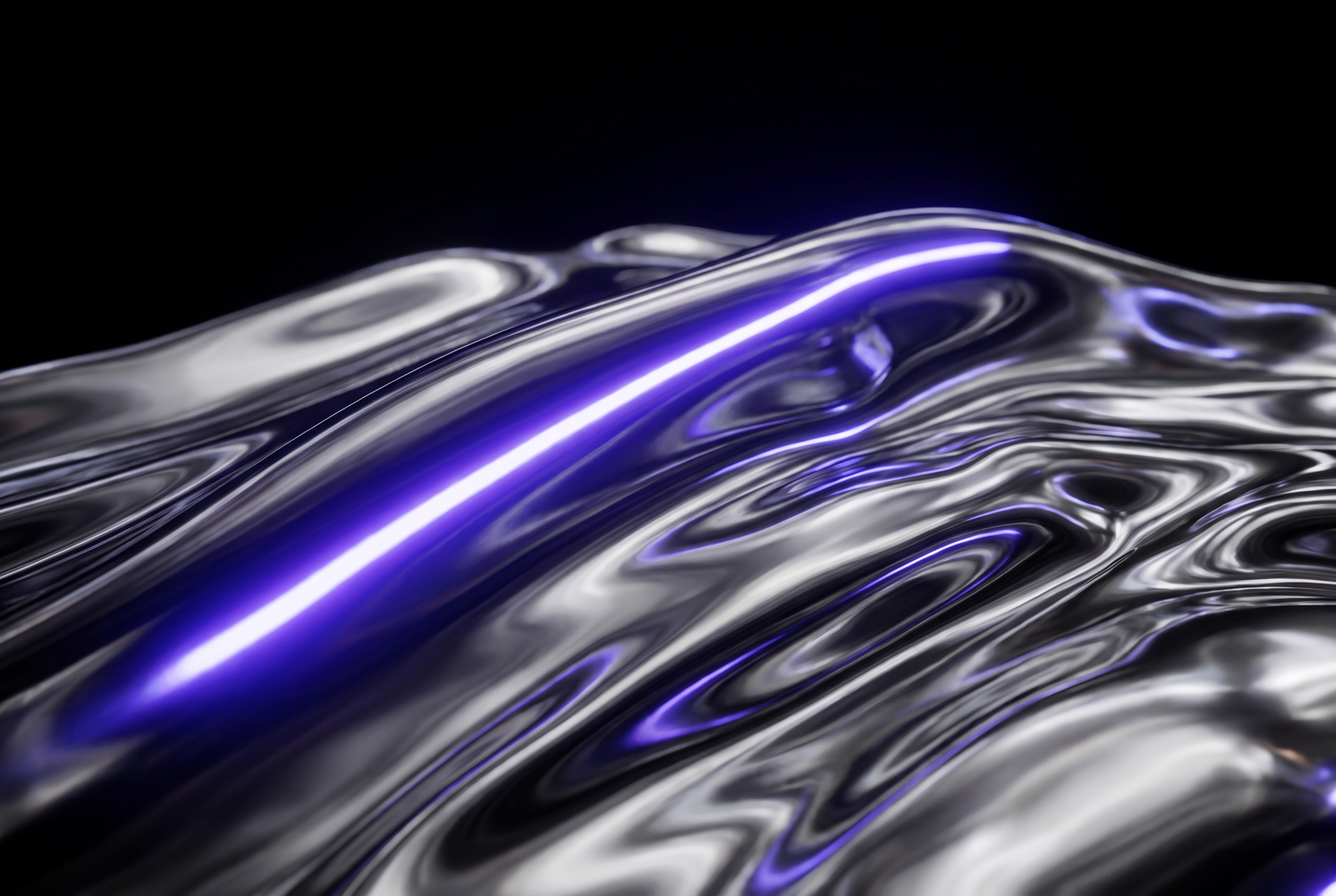 Macro shot of liquid chrome with a violet-blue light streak